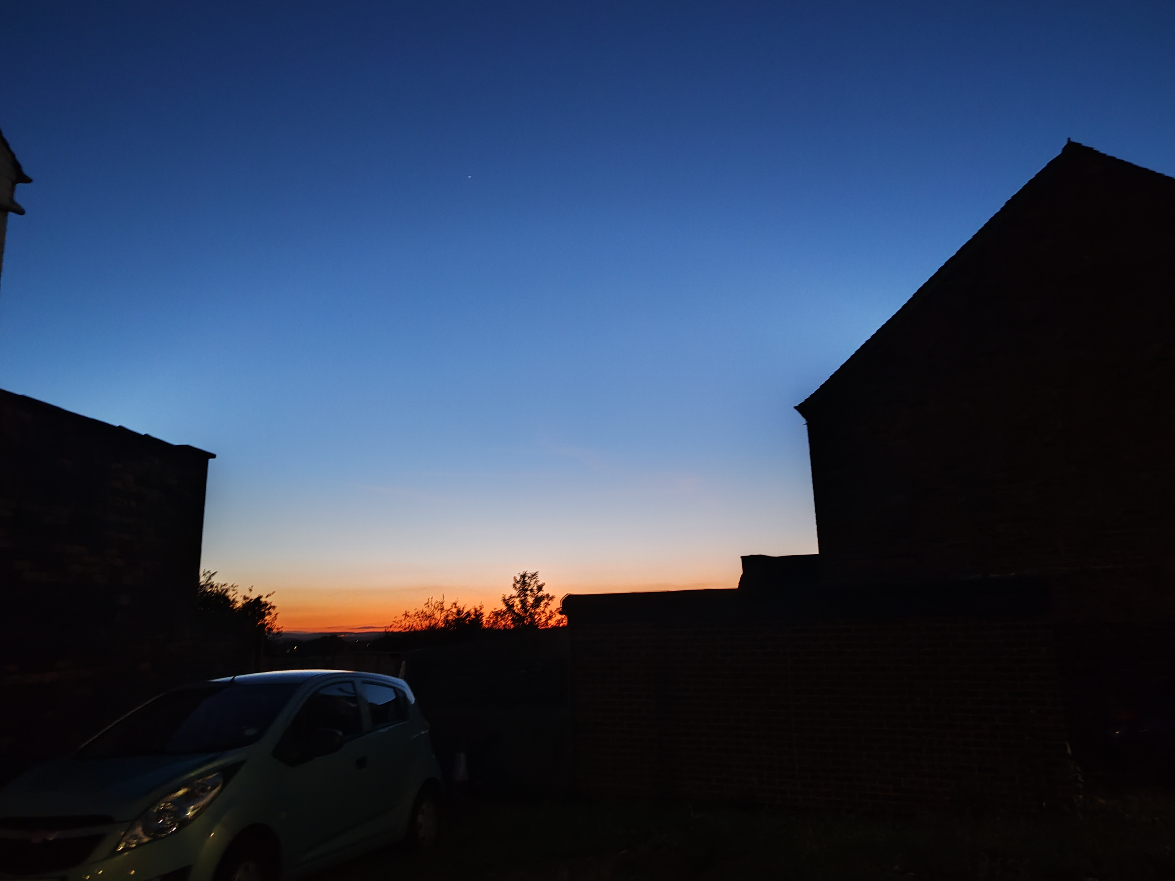 Building silhouette photographed at sunset