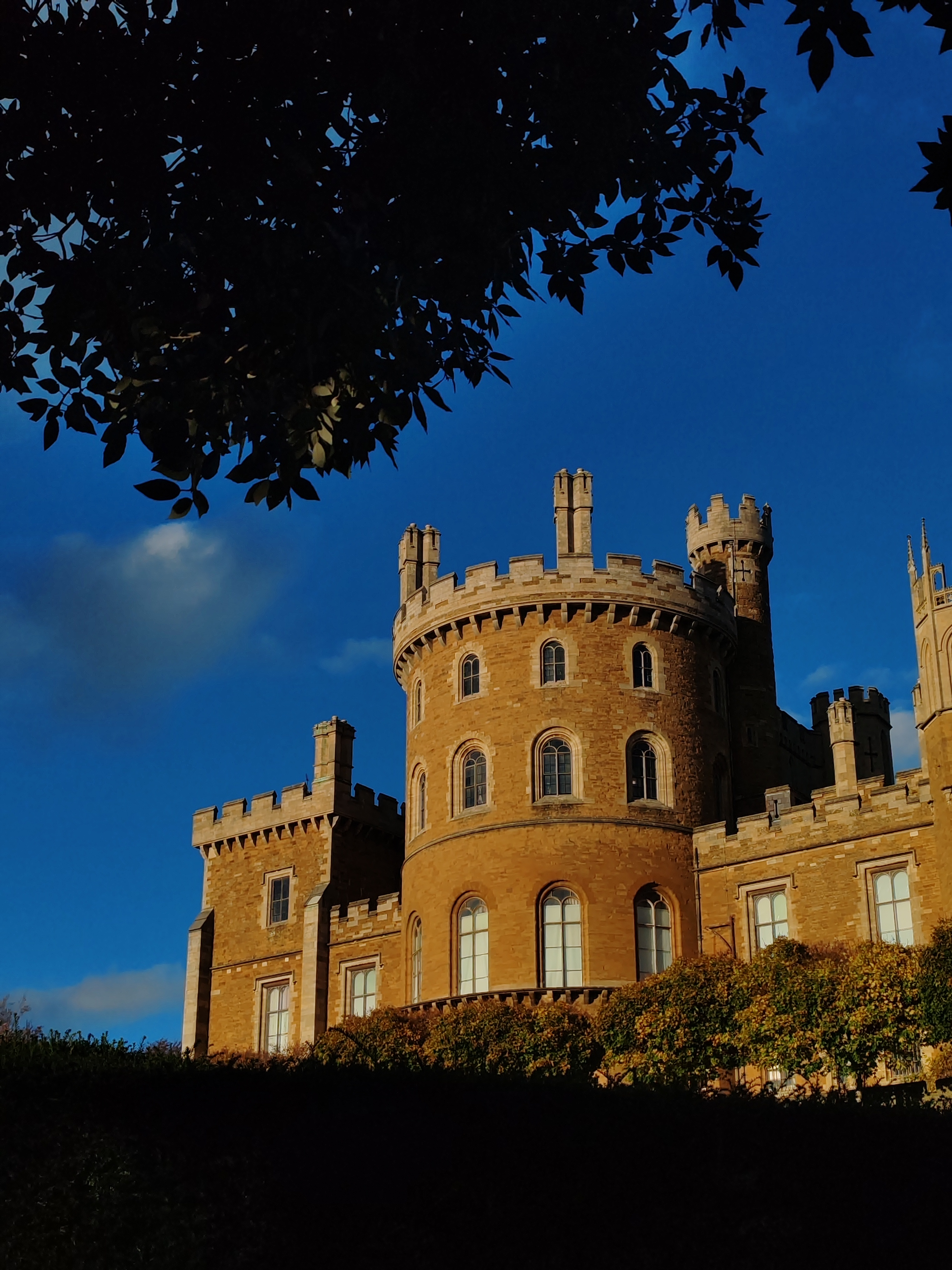 Grand building viewed from a wide angle against blue sky